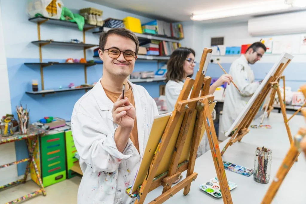 Group of disabled friends in art class